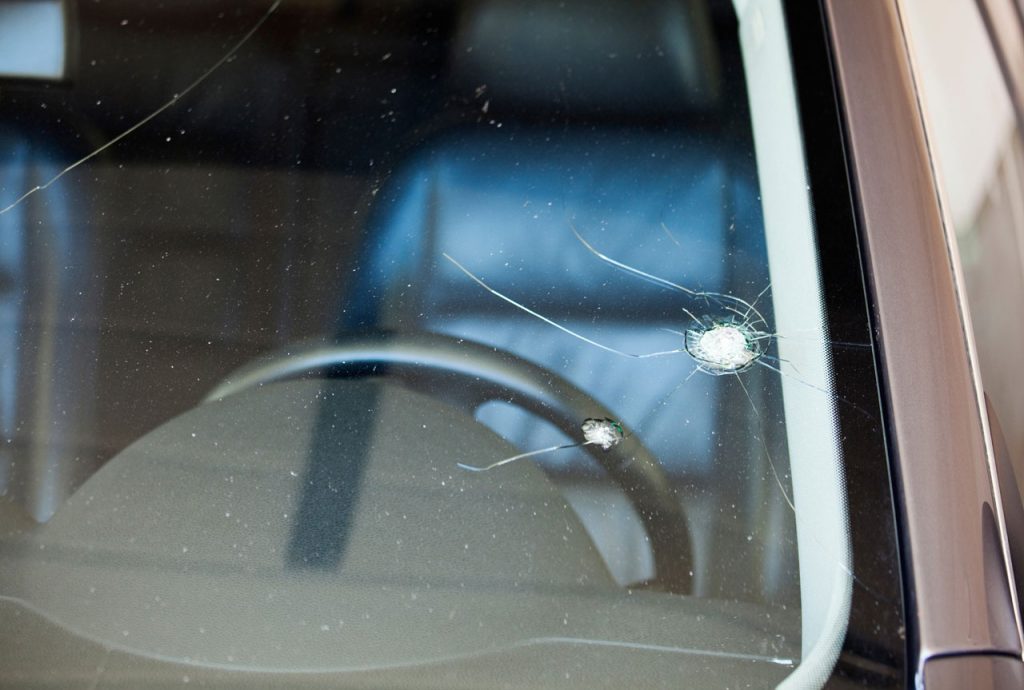 Bullseye chip and crack repair by a trusted windshield repair shop Baltimore technician inside a customer's vehicle.