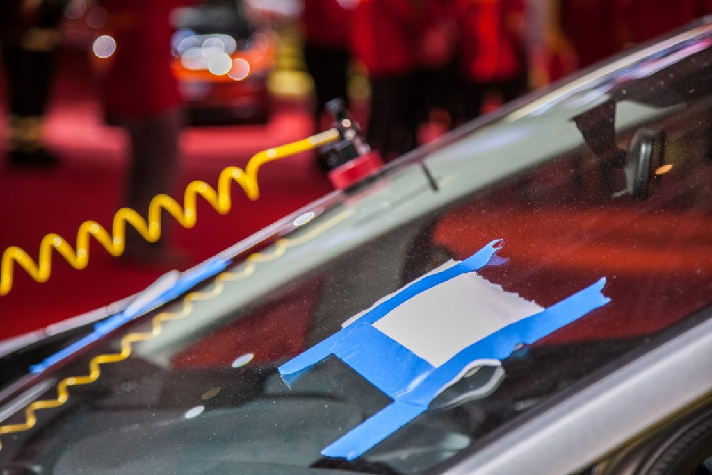 Professional windshield chip repair service by a top auto glass company Baltimore for minor stone damage on a car.