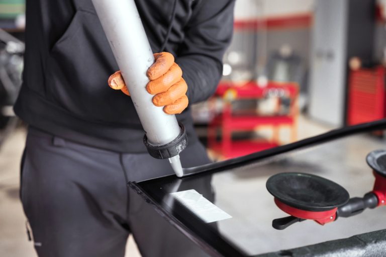 Precision sealant application for a windshield repair Baltimore to ensure a leak proof and secure glass installation.
