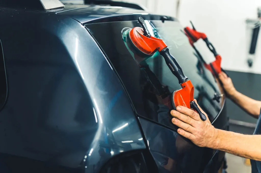 Suction tools used during a rear glass replacement by the specialist team at this windshield fix Baltimore company.